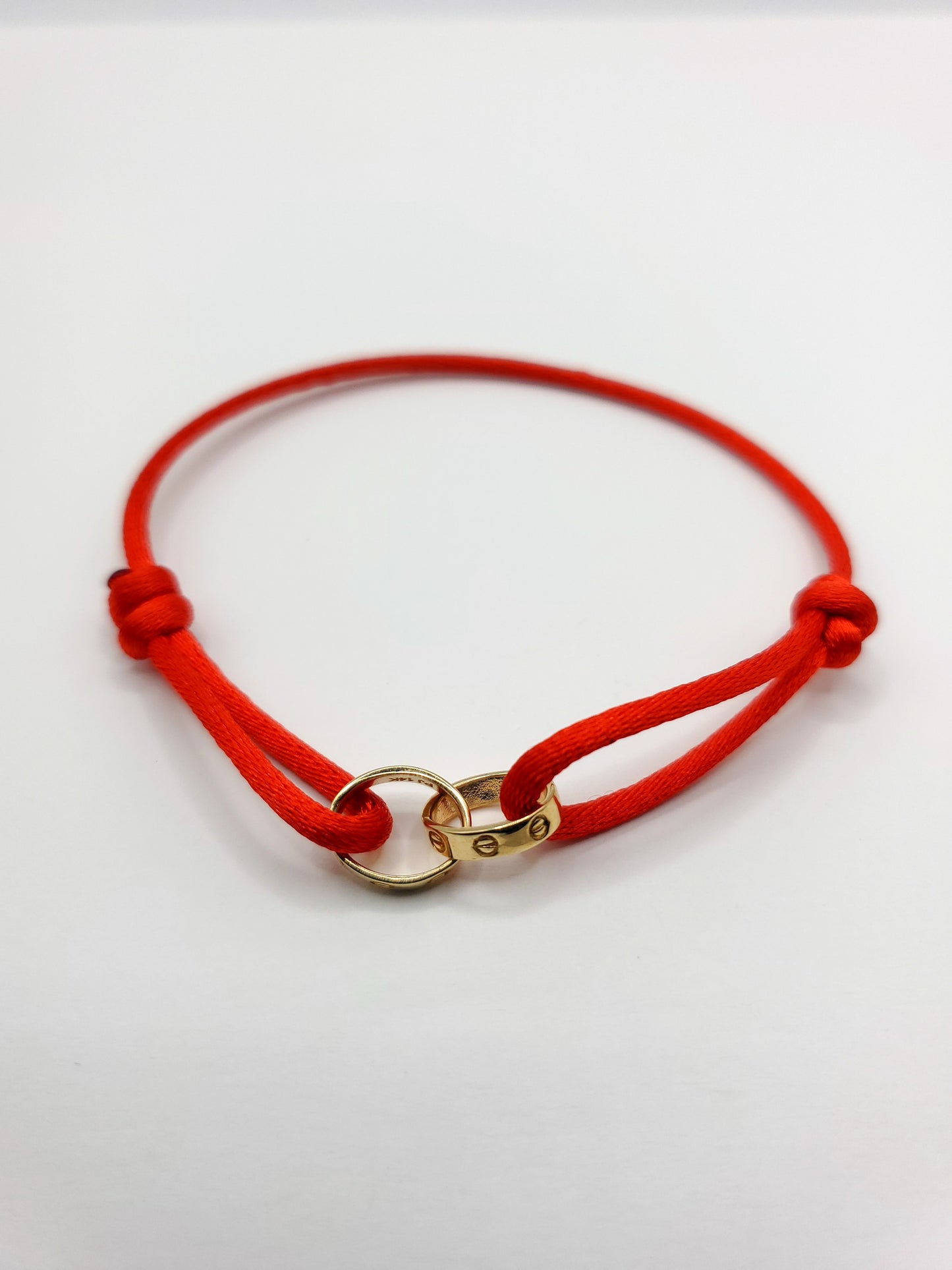 14k gold ring red cord bracelet