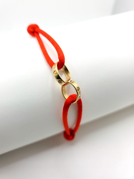 14k gold ring red cord bracelet